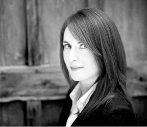 Sarah Ellis: Founder/Architect, Ellis Architects portrait in professional attire